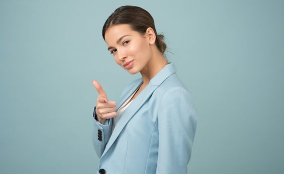 woman wearing blue shawl lapel suit jacket